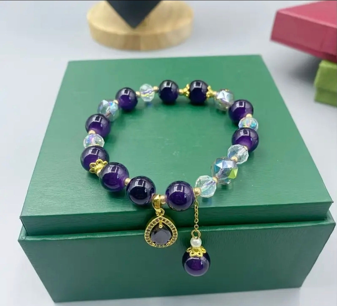 Bracelet en perle de cristal ( coeur en Améthiste )