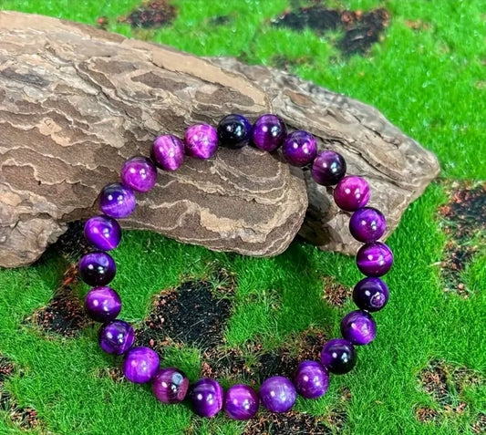 Bracelet en pierre naturelle ( oeil de tigre violet )