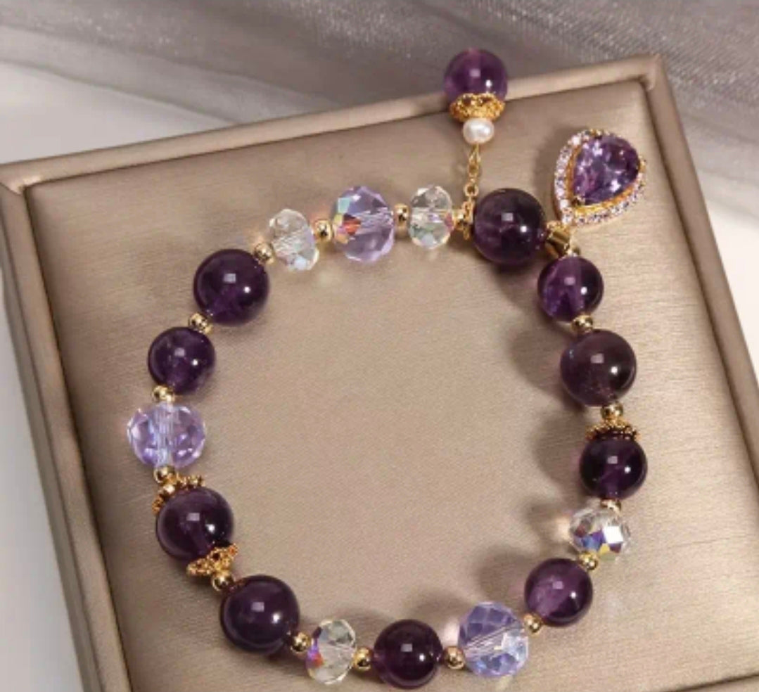 Bracelet en perle de cristal ( coeur en Améthiste )