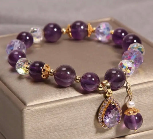 Bracelet en perle de cristal ( coeur en Améthiste )